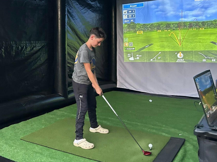 Mobile golf simulator rental at private event in Central New York