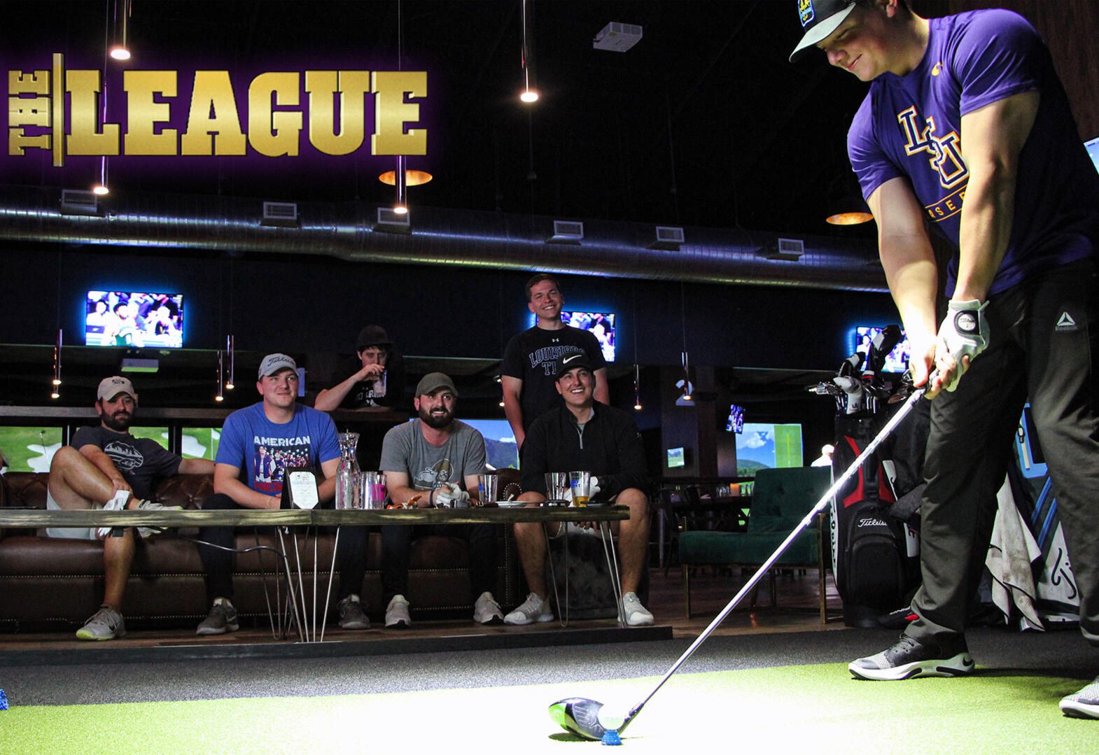 Portable golf simulator set up at bar for league in Central New York